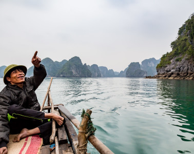 Our ride aboard a fishermen's boat exploring Bai Tu Long in Halong Bay